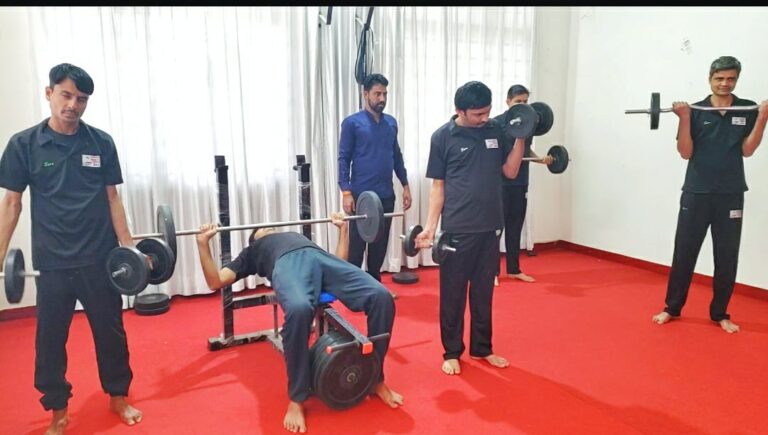 Patients lifting weights during recovery program.