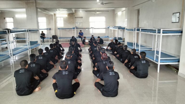 Patients attending a group counseling session inside a rehab centre