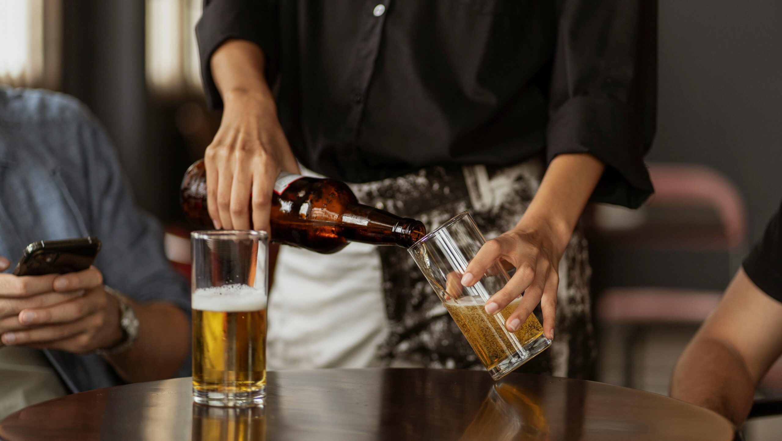 What are the four stages of alcohol addiction?